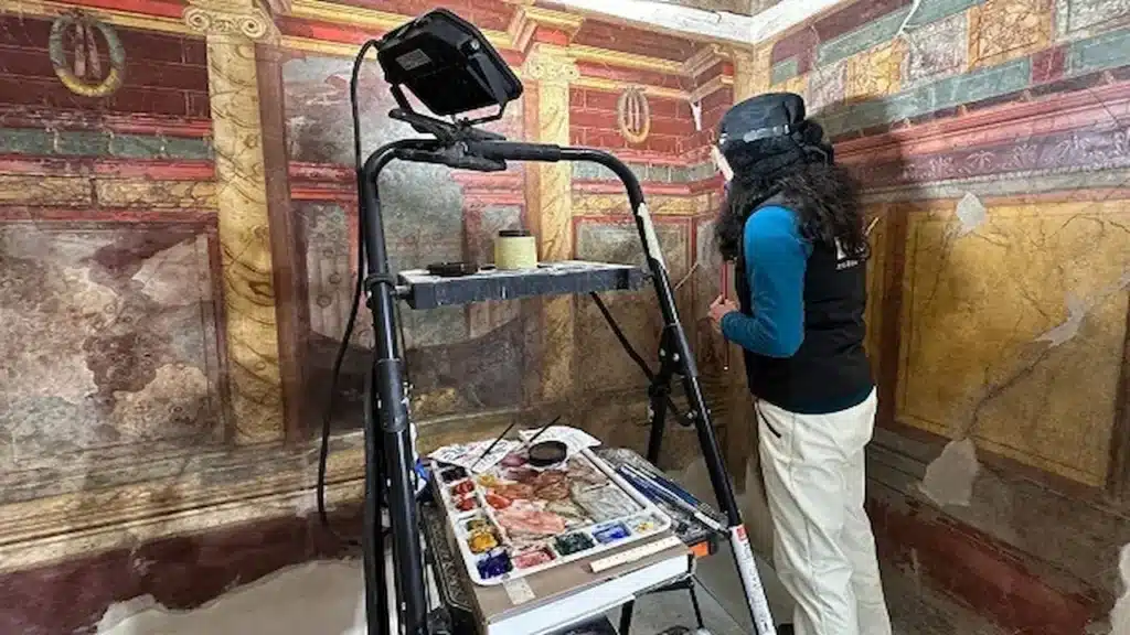 Restauratore a lavoro Villa di Poppea Oplontis