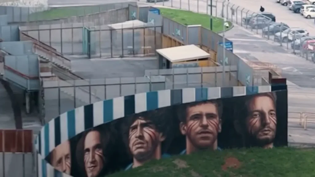 Il murale di Jorit con il volto dei campioni del Napoli. Foto da Metropolis web.